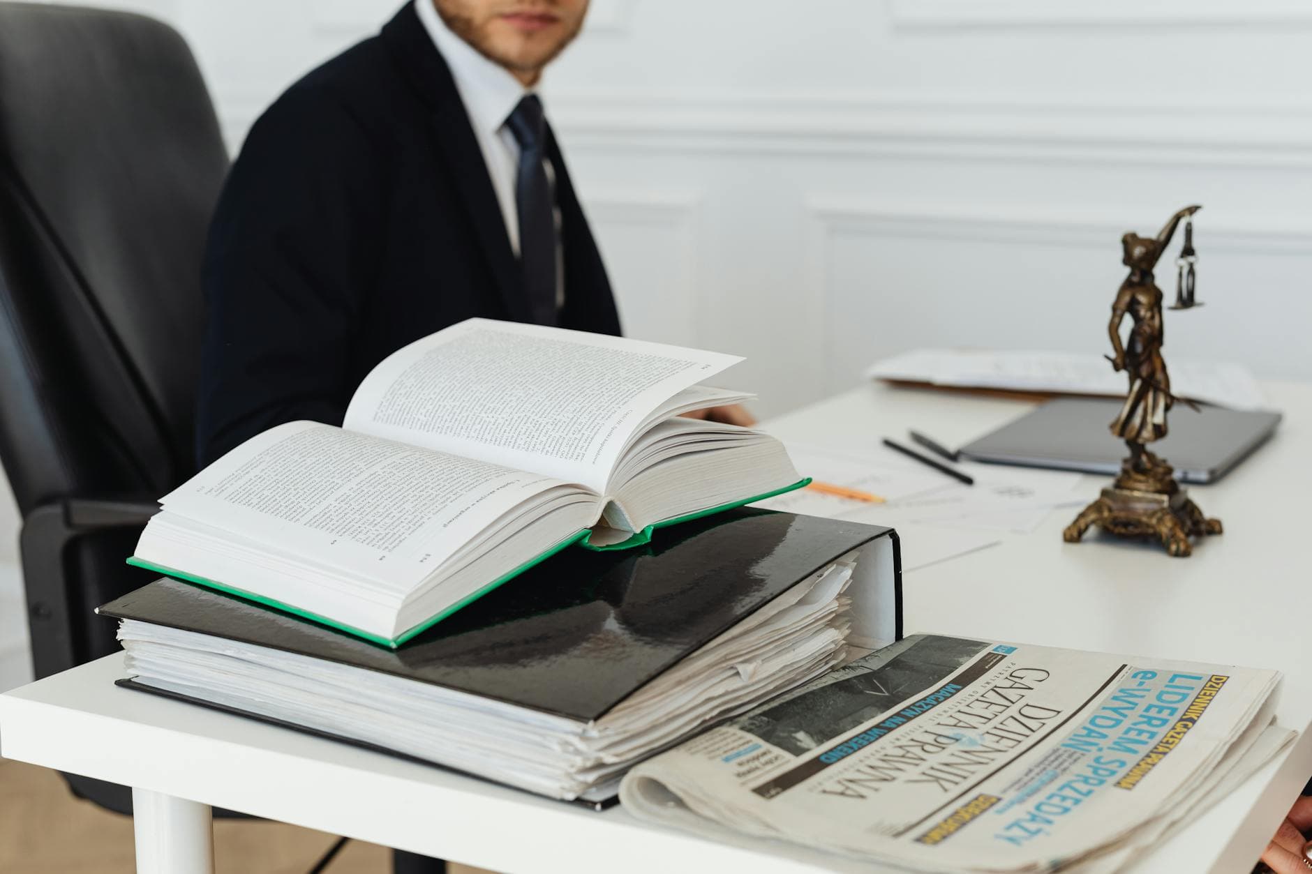 Lawyer's desk with legal books and documents