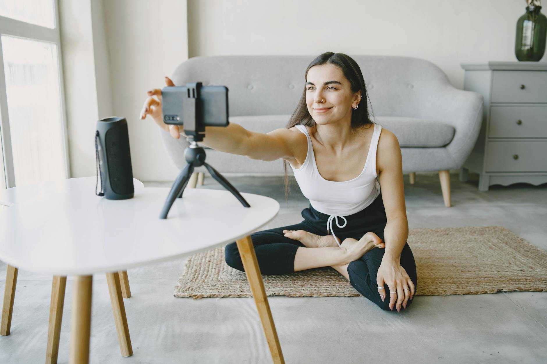 Creator recording a phone video with a tripod