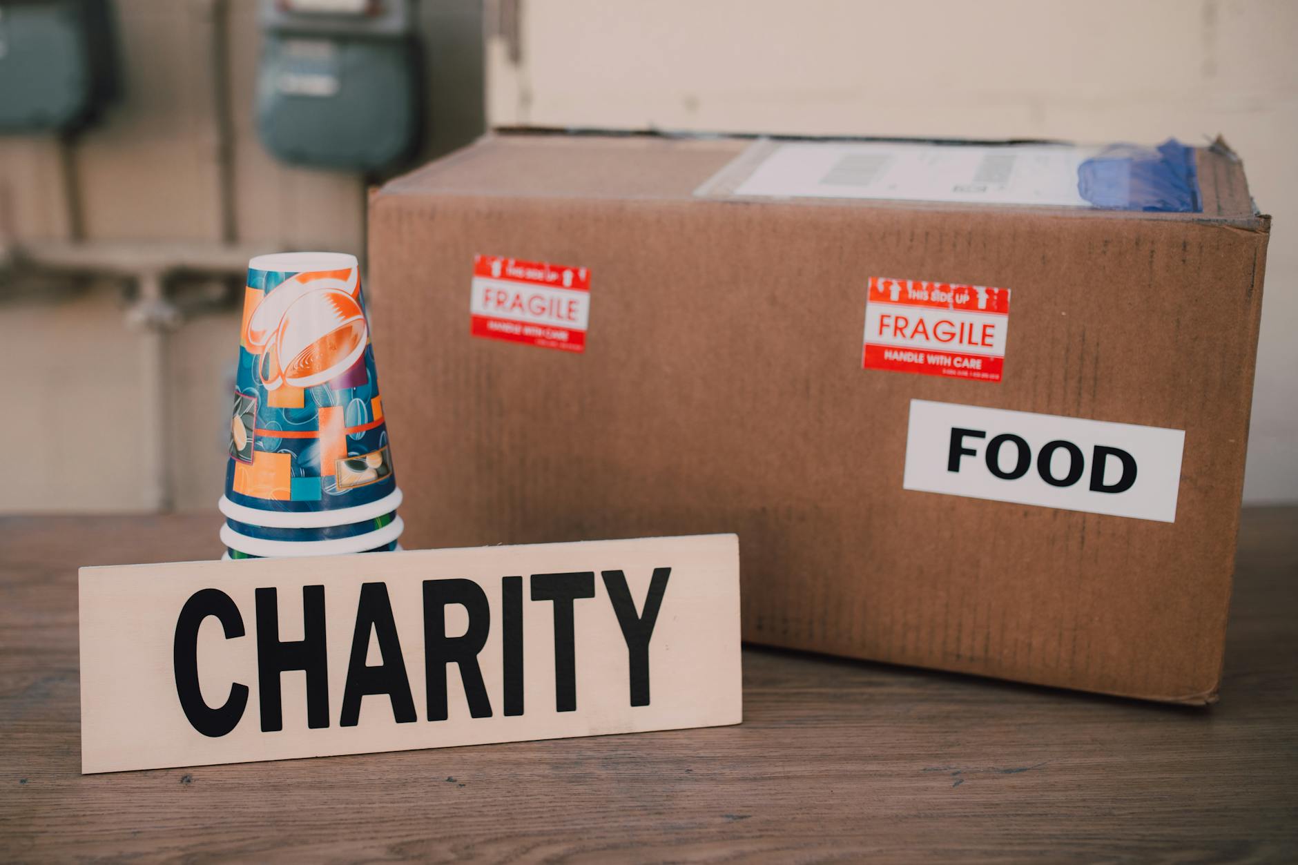 Charity donation box filled with food supplies