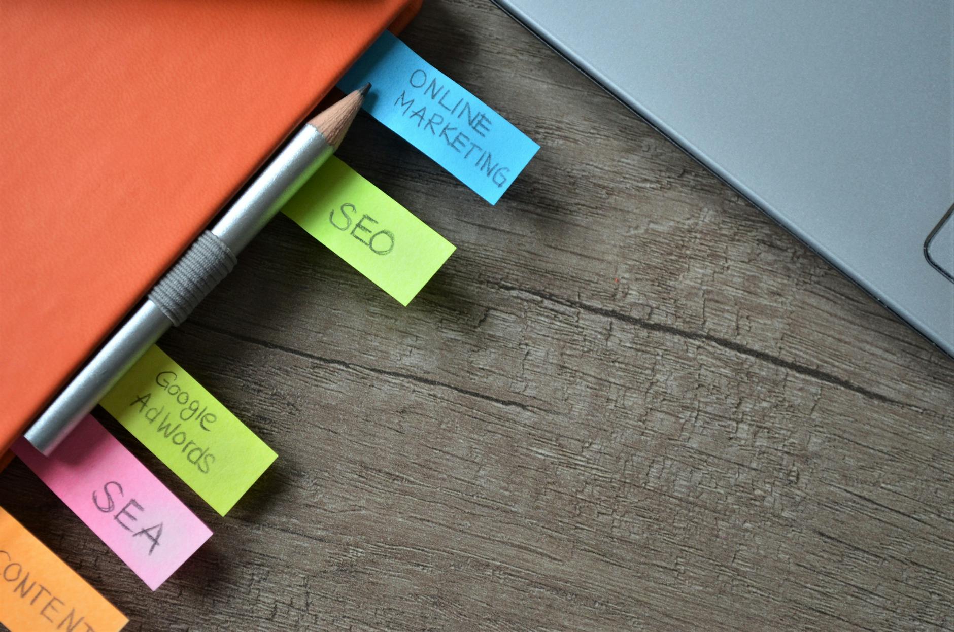 SEO strategy notes with sticky tabs