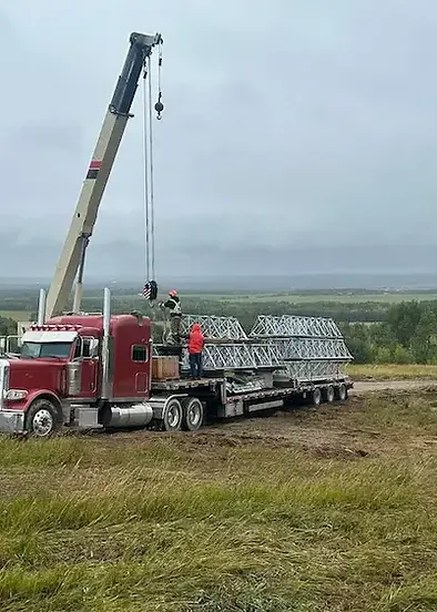 Bowline Logistics truck and crane working on a heavy-haul delivery