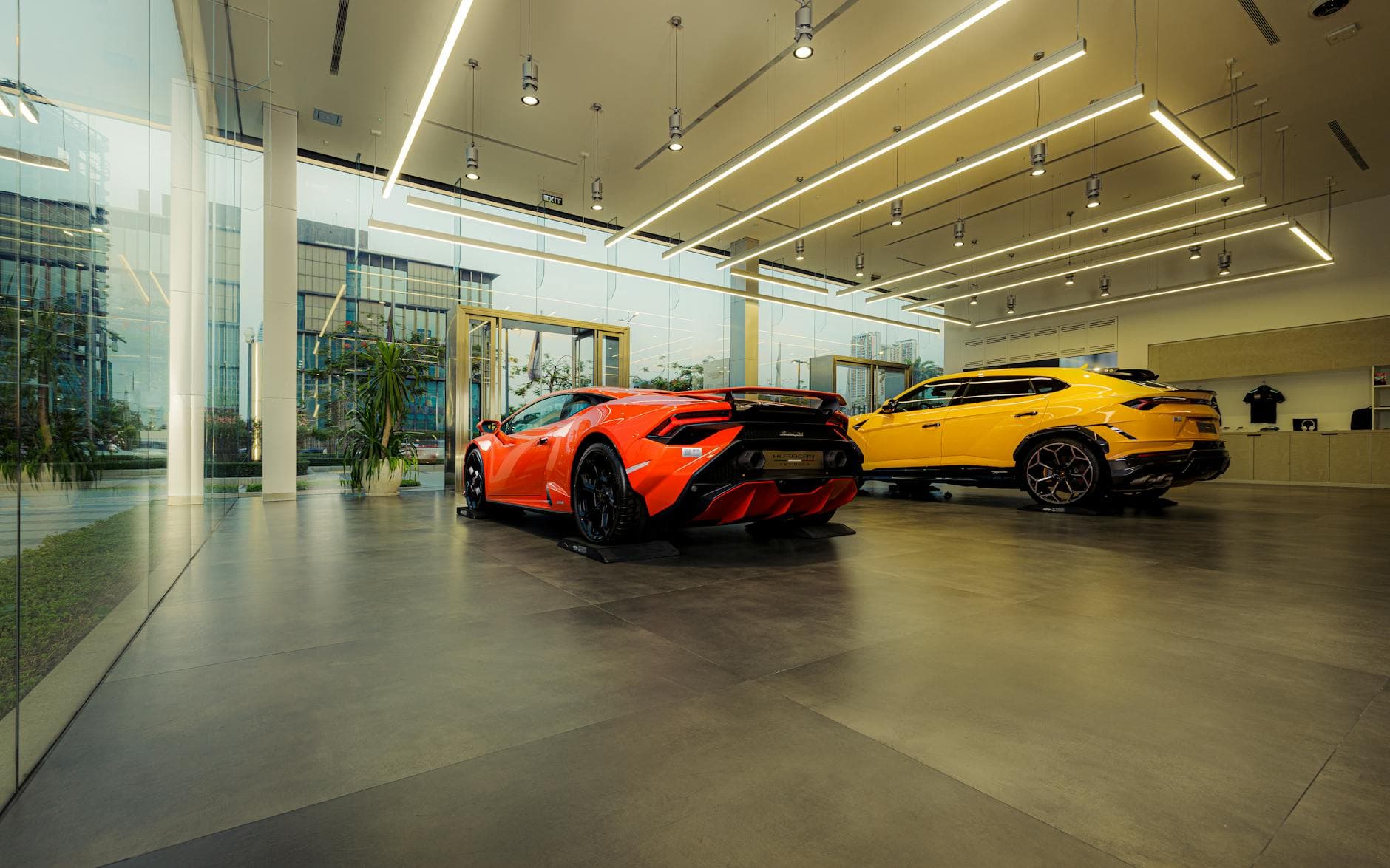 Luxury cars displayed in a dealership showroom