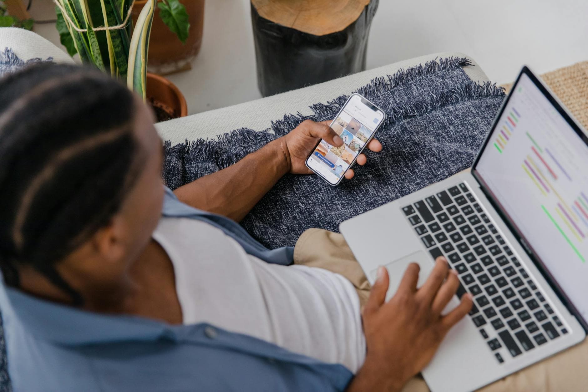 Phone and laptop on a marketing workspace