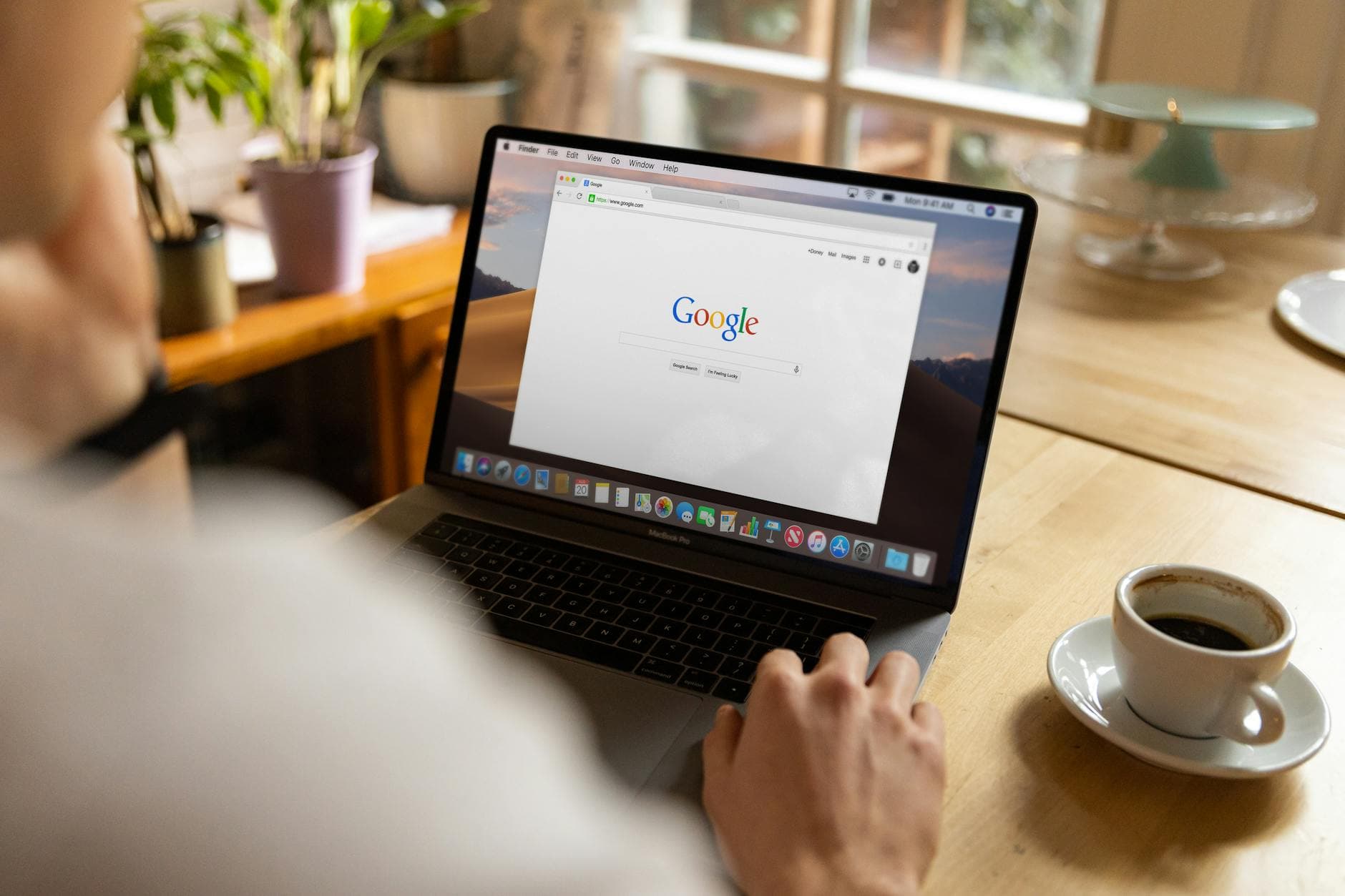 Person using a laptop for search advertising