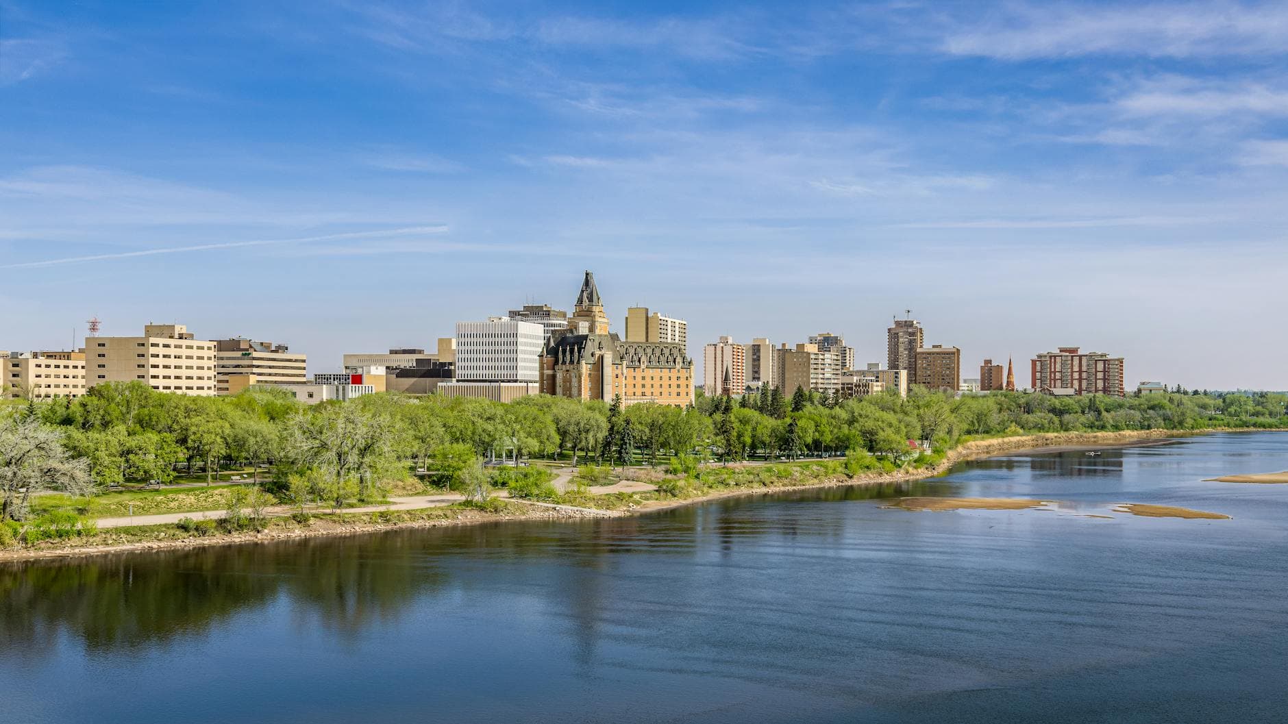 Saskatoon skyline over the riverbank